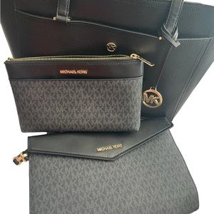 Michael Kors 3 purses. 2 smaller ones fit in the inside